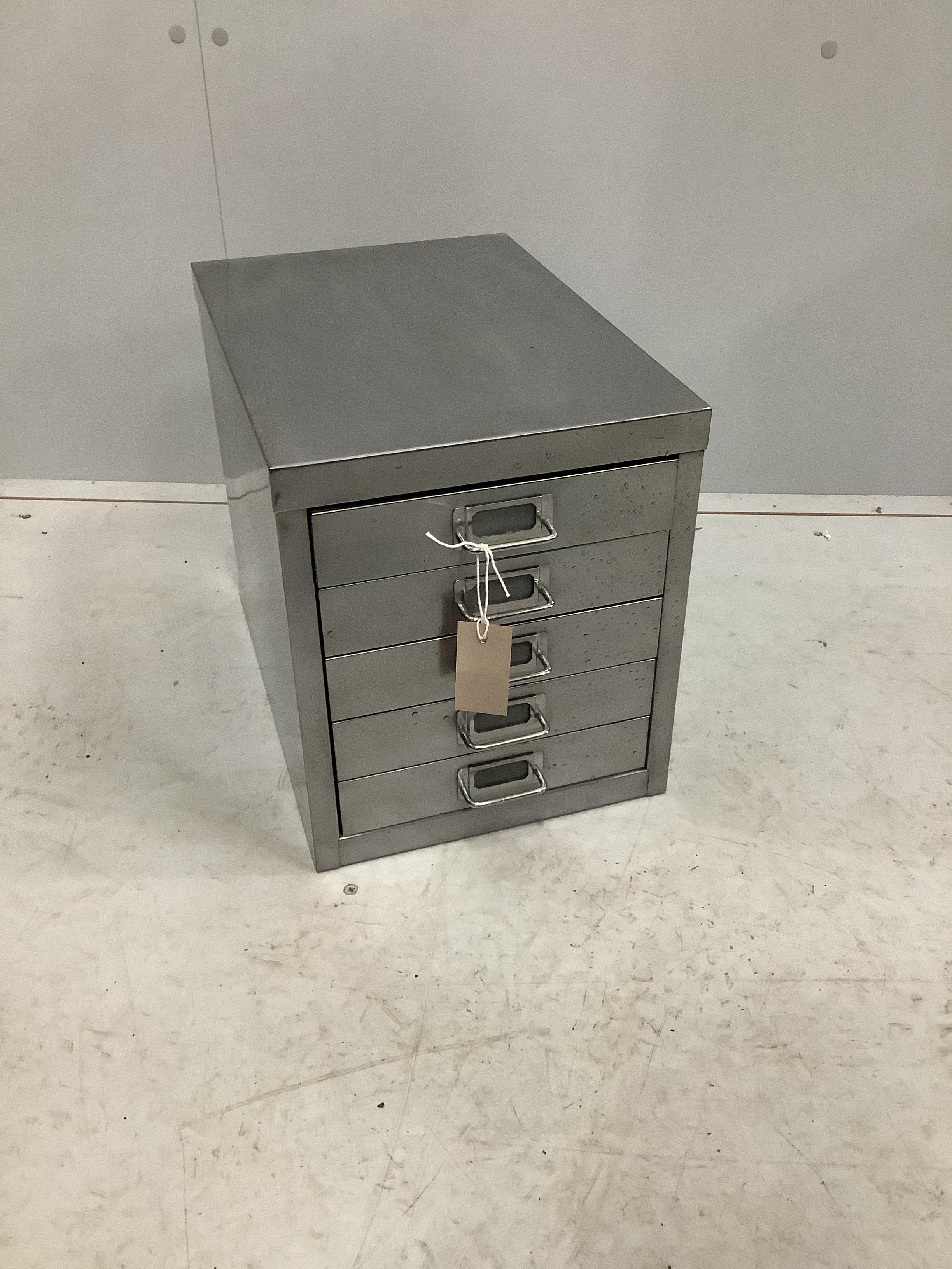 A polished steel five drawer filing chest, width 28cm, depth 41cm, height 33cm